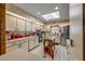 Bright kitchen with white cabinets, skylight, stainless steel appliances at 120 Sand Dunes Dr, Ormond Beach, FL 32176