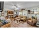 Inviting living room with lots of natural light, hardwood floors and comfortable seating at 120 Sand Dunes Dr, Ormond Beach, FL 32176