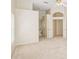 Bright bedroom featuring neutral carpet, a ceiling fan, and ample closet space with double doors at 14313 Roxshire Dr, Orlando, FL 32837