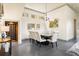 Elegant dining room with a view of the wine cellar at 1539 Corolla Ct, Reunion, FL 34747