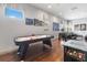 Entertaining game room with an air hockey table, a foosball table, and movie posters at 1539 Corolla Ct, Reunion, FL 34747