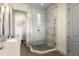 Modern shower with glass enclosure and stylish tile work within a bright bathroom at 1539 Corolla Ct, Reunion, FL 34747