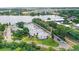 Waterfront condos with well-maintained green spaces, parking, and lake access offers a tranquil setting at 1550 11Th Ne St # H-4, Winter Haven, FL 33881