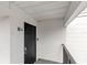 Close-up view of unit entrance, door H4, showing access and exterior details at 1550 11Th Ne St # H-4, Winter Haven, FL 33881
