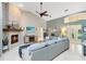 Spacious living room with stone fireplace, light-colored walls, and a comfortable seating area at 1682 Wingspan Way, Winter Springs, FL 32708