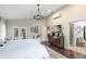 Primary bedroom with a private entrance to the backyard and en-suite bathroom at 1682 Wingspan Way, Winter Springs, FL 32708