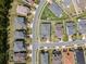 Aerial view of a suburban home showcasing its rectangular layout and position within a residential neighborhood at 16936 Champlain St, Clermont, FL 34714