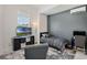 Comfortable bedroom with a desk, and a TV, perfect for relaxing and productivity at 16936 Champlain St, Clermont, FL 34714