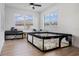 Bright playroom with hardwood floors, lots of natural light, and plenty of room for activities and toys at 16936 Champlain St, Clermont, FL 34714