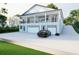 Stately two-story home with a large driveway, a three-car garage, and well-maintained landscaping at 1727 Barrow St, Deltona, FL 32725