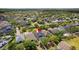 View of a house with a pool and landscaped yard at 1825 Saffron Plum Ln, Orlando, FL 32828
