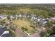 A nice aerial view features a park with walkways and landscaping surrounded by gorgeous homes at 1825 Saffron Plum Ln, Orlando, FL 32828