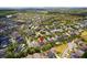 An aerial view shows the well-planned layout of the residential area at 1825 Saffron Plum Ln, Orlando, FL 32828