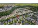 Aerial view showcasing the density and design of the neighborhood at 1825 Saffron Plum Ln, Orlando, FL 32828