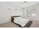 Bright bedroom featuring neutral carpet, platform bed, and natural light from multiple windows at 1825 Saffron Plum Ln, Orlando, FL 32828