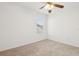 Picture of an empty bedroom featuring carpeted floors and a sun-lit window at 1825 Saffron Plum Ln, Orlando, FL 32828