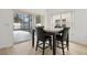 Cozy dining room area with tile floors and screened-in patio at 1825 Saffron Plum Ln, Orlando, FL 32828