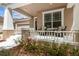 Cozy front porch featuring comfortable seating at 1825 Saffron Plum Ln, Orlando, FL 32828
