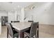 Open floor plan living area with kitchen and staircase views at 1825 Saffron Plum Ln, Orlando, FL 32828