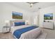 The spacious main bedroom features neutral walls, ceiling fan and carpeted floors at 1825 Saffron Plum Ln, Orlando, FL 32828