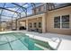 Screened in pool and patio with outdoor seating and lush landscaping at 1825 Saffron Plum Ln, Orlando, FL 32828
