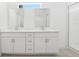 Bathroom featuring double vanity and tile flooring at 1912 Archer Dr, Minneola, FL 34715