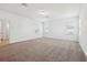 Large bedroom with neutral walls, carpet and multiple windows for natural light at 2236 Hen Rd, Minneola, FL 34715