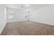 Bright bedroom with carpet, neutral paint and multiple windows bringing in natural light at 2236 Hen Rd, Minneola, FL 34715