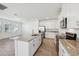 Bright kitchen with an island, granite countertops, stainless steel appliances and lots of cabinet space at 2236 Hen Rd, Minneola, FL 34715