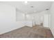 Upstairs loft featuring carpet, light-colored walls, and natural light at 2236 Hen Rd, Minneola, FL 34715