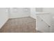 Upstairs loft featuring carpet, light-colored walls, and natural light at 2236 Hen Rd, Minneola, FL 34715