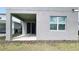 View of the backyard and covered patio, ready for outdoor enjoyment at 2252 Emerald Springs Dr, Apopka, FL 32712