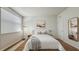 Tastefully decorated bedroom boasts plenty of natural light at 2252 Emerald Springs Dr, Apopka, FL 32712