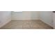 An empty bedroom space with tile flooring and freshly painted white walls at 2252 Emerald Springs Dr, Apopka, FL 32712