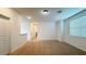Bonus room with neutral carpet, a large window, and convenient access to additional rooms at 2252 Emerald Springs Dr, Apopka, FL 32712