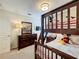 Inviting bedroom with bunk beds, striped bedding, dresser and soft lighting at 2530 Holtrock St, Kissimmee, FL 34747