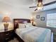 Bedroom with decorative lamps, a ceiling fan, and beautiful furniture at 2530 Holtrock St, Kissimmee, FL 34747