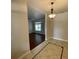 View of the entryway with decorative tile and hardwood floors leading into a living space at 25721 Pinehurst St, Sorrento, FL 32776