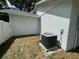 Side yard with AC unit at 25721 Pinehurst St, Sorrento, FL 32776