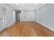 Bright bedroom with hardwood floors, ample closet space and neutral paint, creating a serene atmosphere at 266 Chase Ave, Winter Park, FL 32789