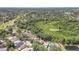 Expansive aerial view showcasing the lush greenery and nature surrounding the home in the community at 271 Morning Glory Dr, Lake Mary, FL 32746