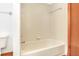 A well-maintained tiled bathtub with a shower rack is shown in this bathroom at 271 Morning Glory Dr, Lake Mary, FL 32746