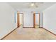 Bright bedroom offering neutral walls, carpet flooring, and closet at 271 Morning Glory Dr, Lake Mary, FL 32746