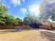 Community dog park featuring picnic tables and shaded areas at 271 Morning Glory Dr, Lake Mary, FL 32746
