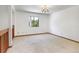 Spacious living room offering neutral walls and carpet flooring at 271 Morning Glory Dr, Lake Mary, FL 32746