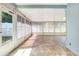 Bright, airy sunroom with tile floor, perfect for indoor/outdoor living at 271 Morning Glory Dr, Lake Mary, FL 32746