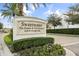 Community entrance sign amidst lush landscaping, showcasing a prestigious golf and country club at 2710 Bolzano Dr, Apopka, FL 32712