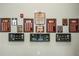 Decorated wall displaying community achievements, memorabilia, and awards in detailed frames at 2710 Bolzano Dr, Apopka, FL 32712