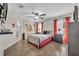 Comfortable bedroom with hardwood floors and plenty of natural light at 280 Bay St, Apopka, FL 32712