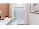 Clean bathroom with a stylish shower, tiled walls, and modern fixtures at 2903 Canary Ave, Davenport, FL 33837